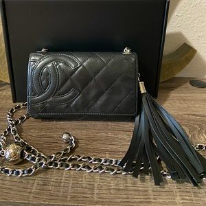 CHANEL Black Quilted Crossbody Bag with Tassel